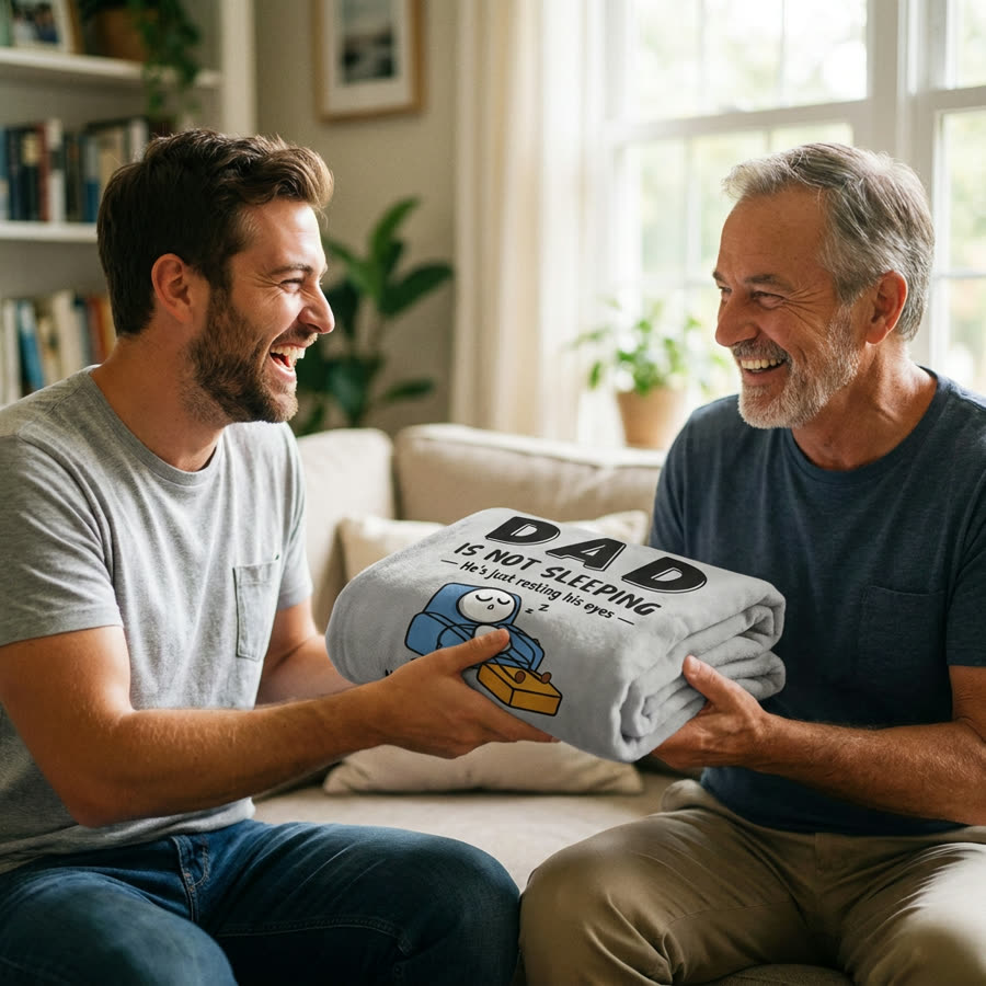 Son giving the blanket to his dad